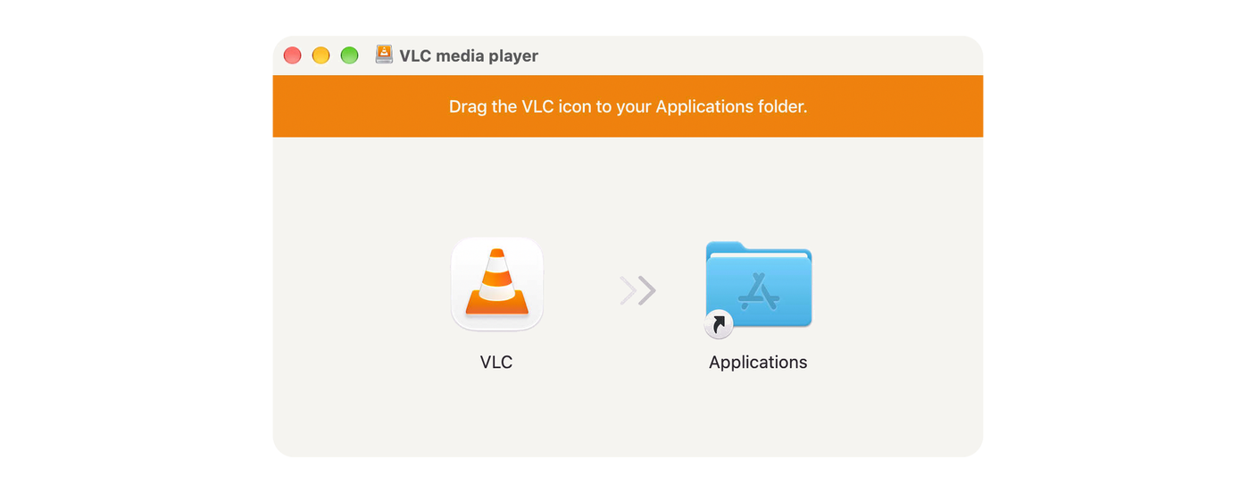 The VLC disk image offers to drag the app into the Applications folder.